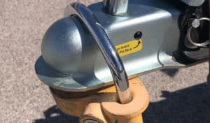how to remove a trailer hitch lock